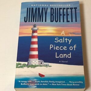 A Salty Piece of Land Novel by Jimmy Buffett, paperback,pre-owned,pet/smoke free